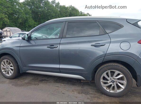 KM8J3CA46HU256450 2017 HYUNDAI TUCSON Gray 360 interior view