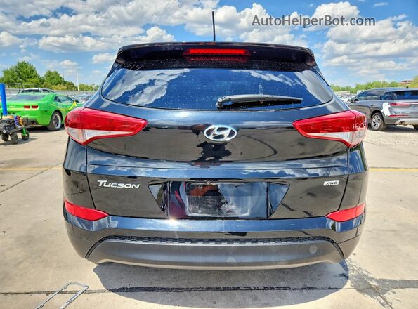 KM8J3CA46HU522758 2017 HYUNDAI TUCSON Black Vista trasera