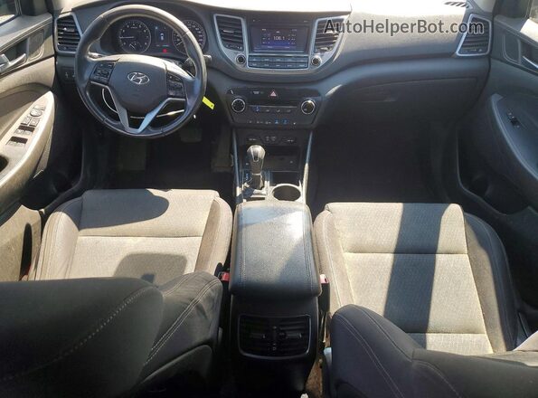 KM8J3CA47GU167100 2016 HYUNDAI TUCSON Brown Widok deski rozdzielczej