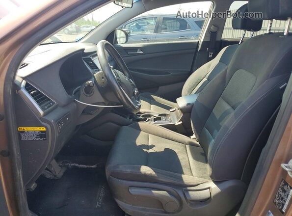 KM8J3CA47GU167100 2016 HYUNDAI TUCSON Brown Widok wnętrza z przodu