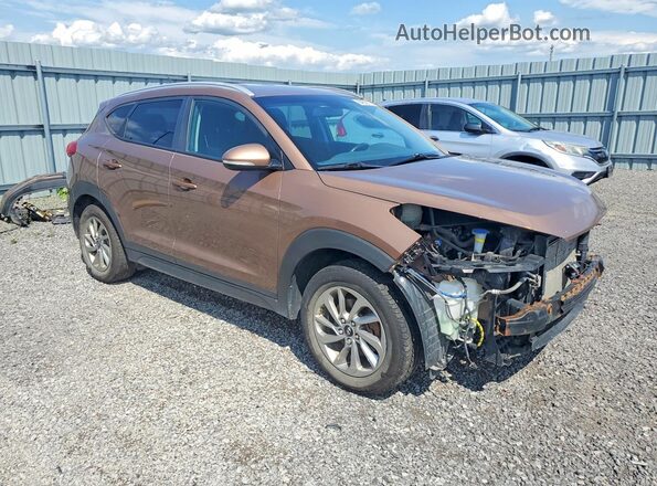 KM8J3CA47GU167100 2016 HYUNDAI TUCSON Brown Przód prawy