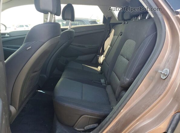 KM8J3CA47GU167100 2016 HYUNDAI TUCSON Brown Widok wnętrza z tyłu