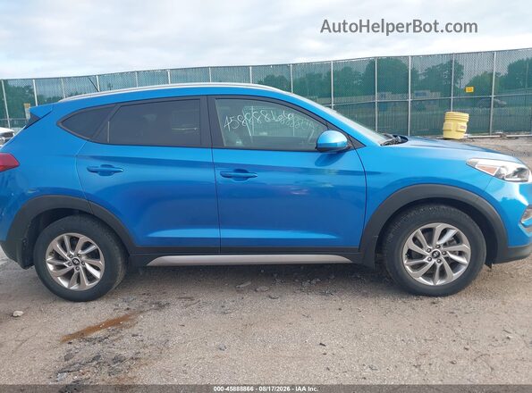 KM8J3CA47HU350353 2017 HYUNDAI TUCSON Blue Rear interior view