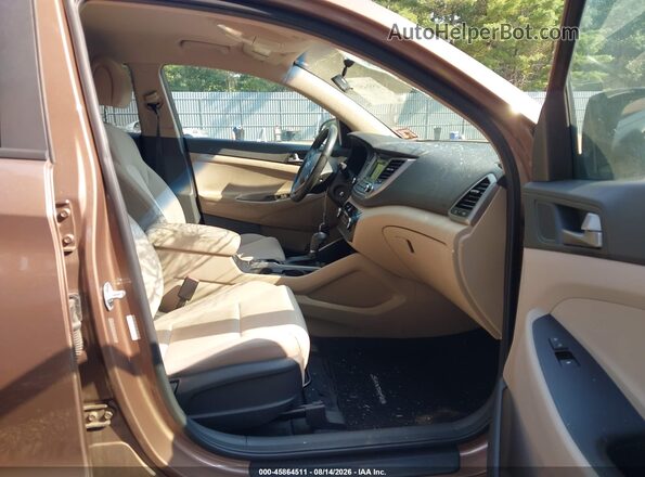 KM8J3CA47HU510568 2017 HYUNDAI TUCSON Brown Widok wnętrza z przodu