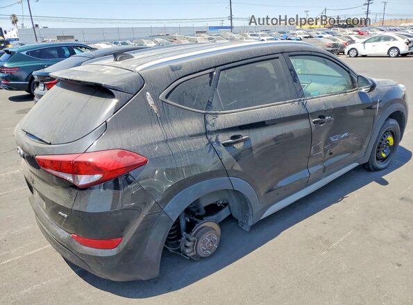 KM8J3CA47JU694643 2018 HYUNDAI TUCSON Black Trasero derecho