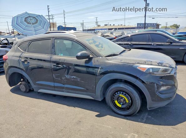KM8J3CA47JU694643 2018 HYUNDAI TUCSON Black Delantero derecho