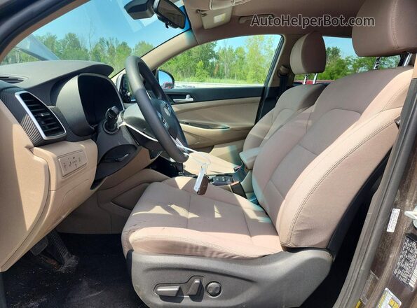 KM8J3CA49LU159896 2020 HYUNDAI TUCSON Коричневый Вид салона спереди