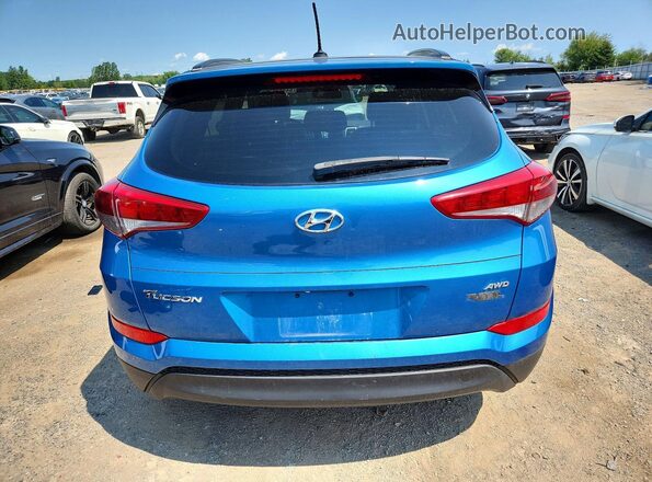 KM8J3CA4XHU497539 2017 HYUNDAI TUCSON Blue Rear view