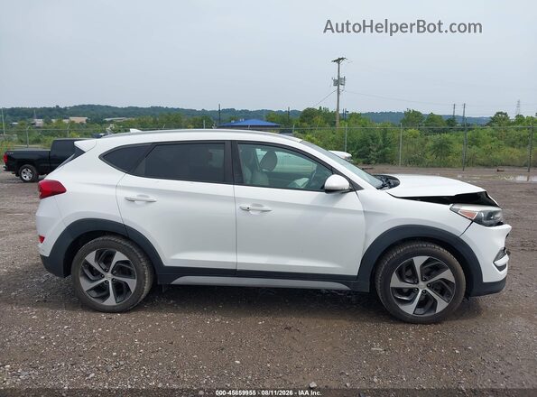KM8J3CAL0JU777984 2018 HYUNDAI TUCSON White Rear interior view