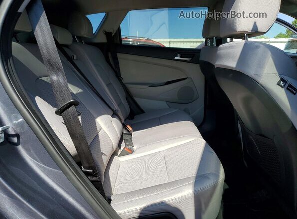 KM8J3CAL0KU017409 2019 HYUNDAI TUCSON Gray Սալոնի հետևի տեսք