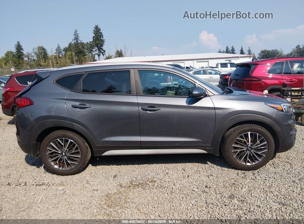 KM8J3CAL1KU840916 2019 HYUNDAI TUCSON Серый Вид задней части салона