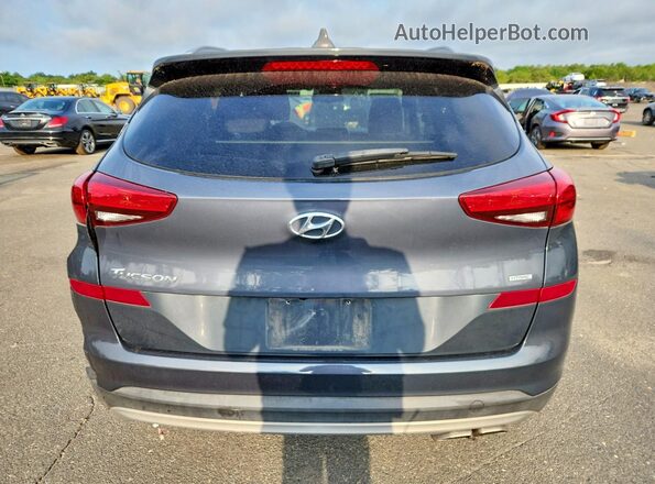 KM8J3CAL1MU389618 2021 HYUNDAI TUCSON Gray Rear view