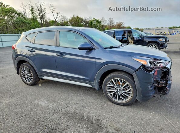 KM8J3CAL1MU389618 2021 HYUNDAI TUCSON Gray Front right