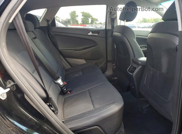 KM8J3CAL3KU056673 2019 HYUNDAI TUCSON Черный Вид задней части салона