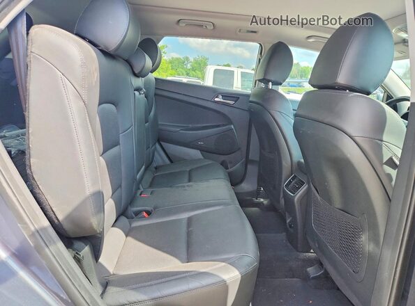 KM8J3CAL6KU968066 2019 HYUNDAI TUCSON Gray Սալոնի հետևի տեսք