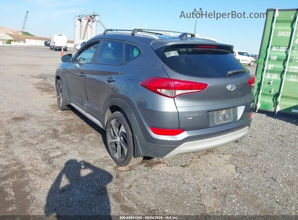 KM8J3CAL7JU716583 2018 HYUNDAI TUCSON Gray Trasero izquierdo