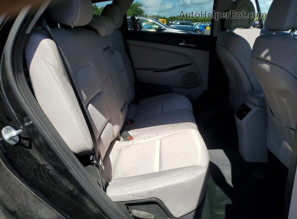 KM8J3CAL8JU770474 2018 HYUNDAI TUCSON Black Widok wnętrza z tyłu