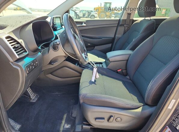 KM8J3CAL8KU968862 2019 HYUNDAI TUCSON Серый Вид салона спереди