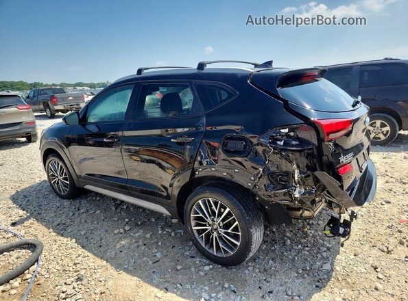KM8J3CAL8MU406110 2021 HYUNDAI TUCSON Black Trasero izquierdo