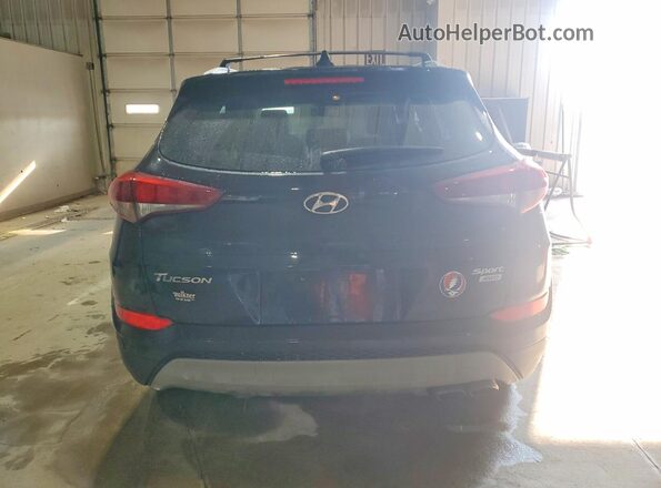 KM8J3CALXJU763834 2018 HYUNDAI TUCSON Black Rear view
