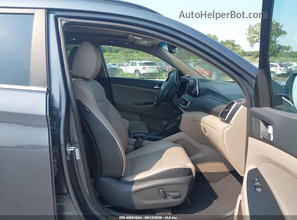 KM8J3CALXKU016963 2019 HYUNDAI TUCSON Blue წინა სალონის ხედი