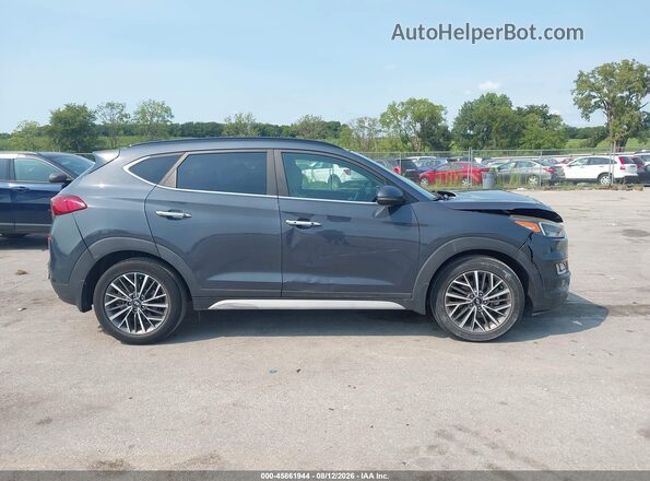 KM8J3CALXKU016963 2019 HYUNDAI TUCSON Blue უკანა სალონის ხედი