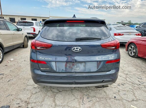 KM8J3CALXKU038395 2019 HYUNDAI TUCSON Gray Вид ззаду