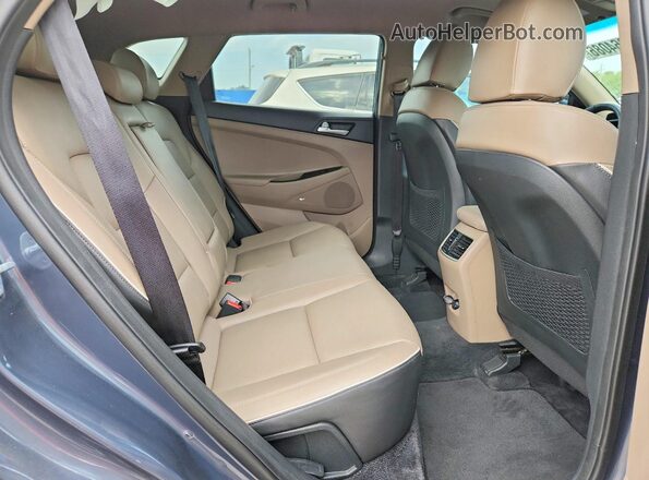 KM8J3CALXKU038395 2019 HYUNDAI TUCSON Gray Вид задньої частини салону