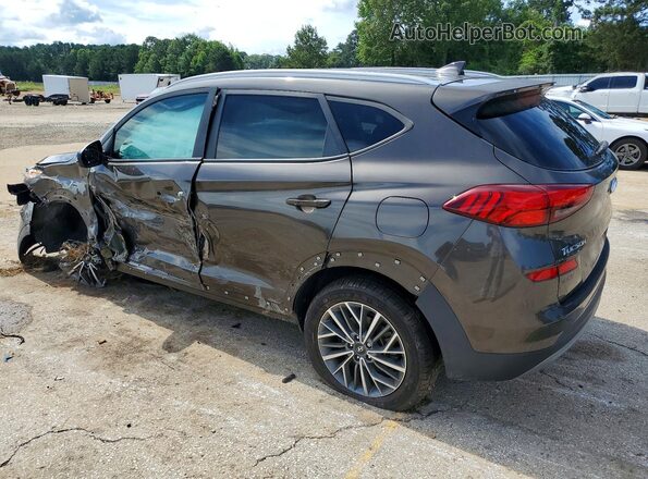 KM8J3CALXKU993519 2019 HYUNDAI TUCSON Brown Trasero izquierdo