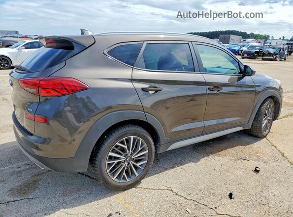 KM8J3CALXKU993519 2019 HYUNDAI TUCSON Brown Trasero derecho