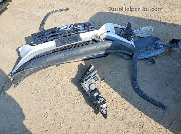 KM8JB3AE0NU022988 2022 HYUNDAI TUCSON White VIN կոդի պիտակի տեսք
