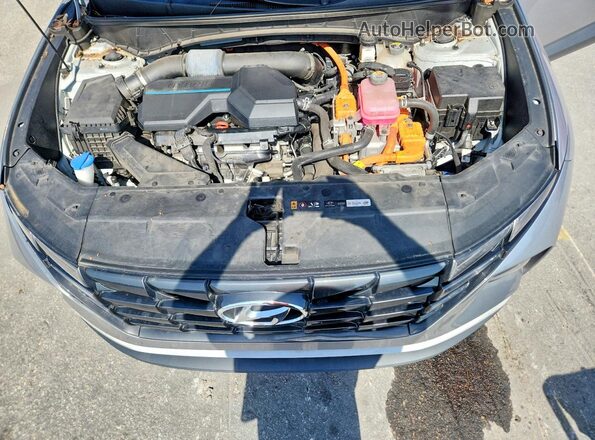 KM8JBCA11NU048772 2022 HYUNDAI TUCSON Silver Շարժիչի բաժամունքի տեսք