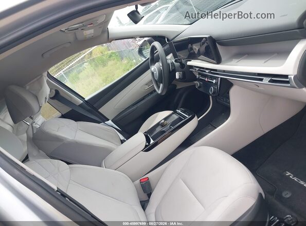 KM8JBDD14SU321488 2025 HYUNDAI TUCSON HYBRID Silver Вид салону спереду