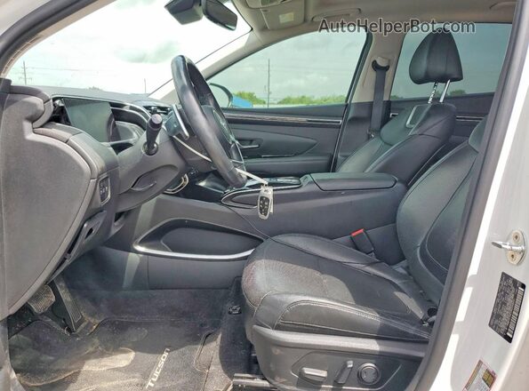 KM8JE3AEXNU068691 2022 HYUNDAI TUCSON White Вид салону спереду