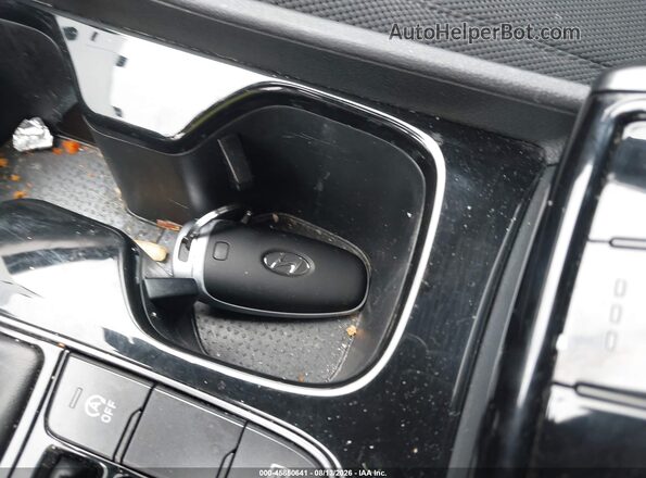KM8JF3AE9NU138310 2022 HYUNDAI TUCSON White Vista del salpicadero