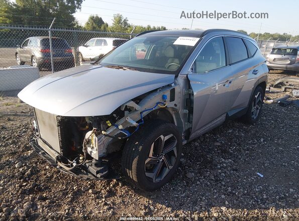 KM8JFCA16NU073297 2022 HYUNDAI TUCSON HYBRID Silver Front left