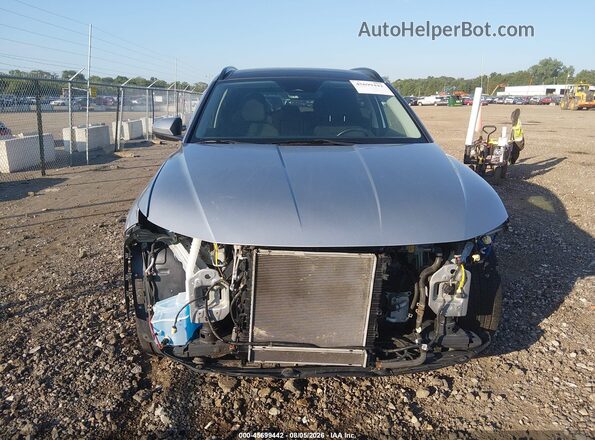 KM8JFCA16NU073297 2022 HYUNDAI TUCSON HYBRID Silver Rear interior view