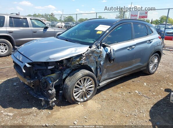 KM8K22AA2LU573397 2020 HYUNDAI KONA Серебряный Передняя левая четверть