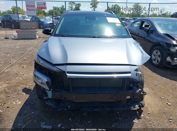 KM8K22AA2LU573397 2020 HYUNDAI KONA Серебряный Вид задней части салона