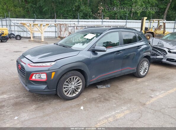 KM8K2CAA1JU169302 2018 HYUNDAI KONA Gray Front left