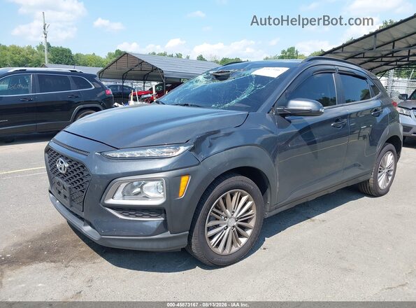 KM8K2CAA7JU184399 2018 HYUNDAI KONA Серый Передняя левая четверть