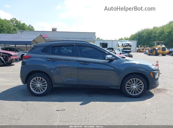 KM8K2CAA7JU184399 2018 HYUNDAI KONA Серый Вид задней части салона