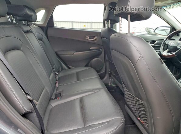 KM8K33A51JU072861 2018 HYUNDAI KONA Gray Vista interior trasera