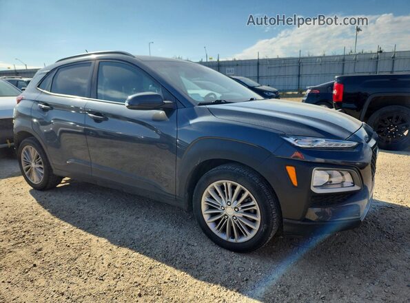 KM8K6CAA3JU073076 2018 HYUNDAI KONA Gray Delantero derecho