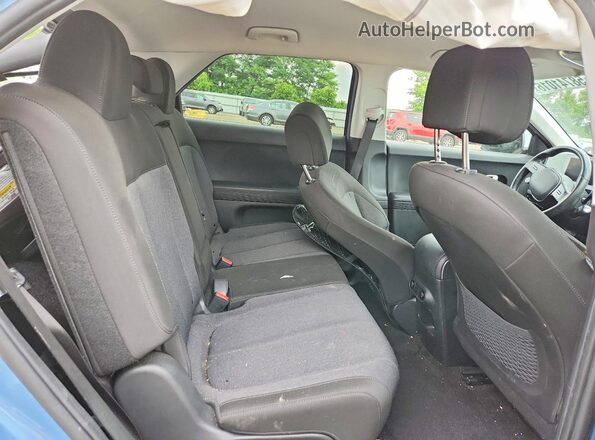 KM8KM4AE7NU053952 2022 HYUNDAI IONIQ Blue Սալոնի հետևի տեսք