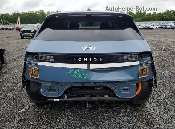 KM8KM4AEXPU180004 2023 HYUNDAI IONIQ Blue Vista trasera