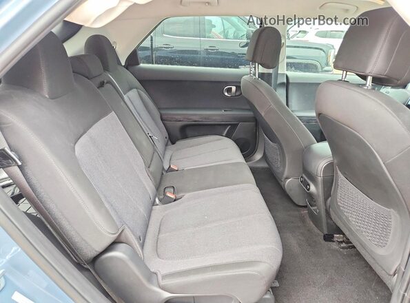 KM8KMDAF4PU217704 2023 HYUNDAI IONIQ Blue Rear interior view