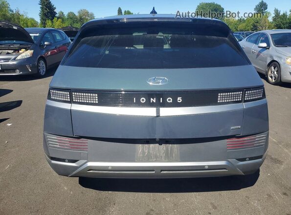 KM8KMDAF9PU214605 2023 HYUNDAI IONIQ Green Вид ззаду