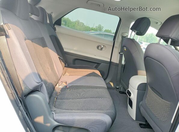 KM8KMDDF9RU317831 2024 HYUNDAI IONIQ White Vista interior trasera