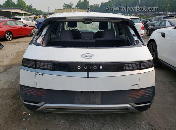 KM8KMDDF9RU317831 2024 HYUNDAI IONIQ White Vista trasera